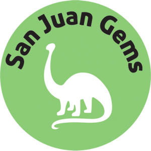 San Juan Gems round green logo with a white sauropod dinosaur silhouette, from the official sanjuangems.com site.